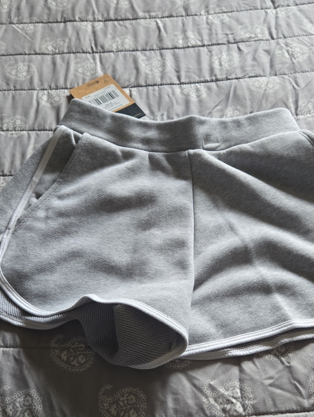 The North Face Women's Light Gray Athletic Shorts with White Trim